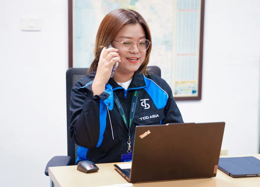 Sujitta working with colleagues